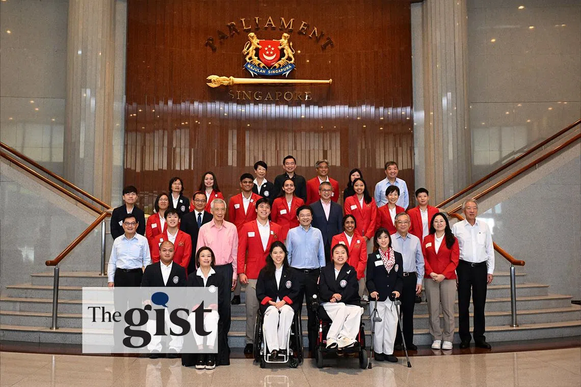 PM Lawrence Wong and various cabinet ministers in a group photo with Team Singapore Olympians and Paralympians on Oct 16.