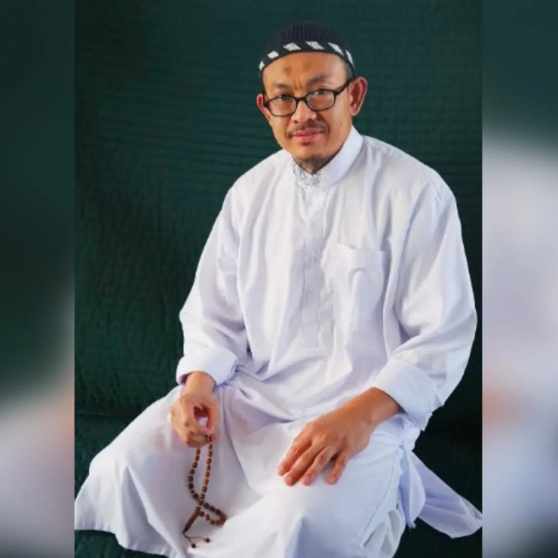 Detainee Mohammed Farik Amin is no longer being tried with two other suspects in the case, according to a court filing posted this week. 