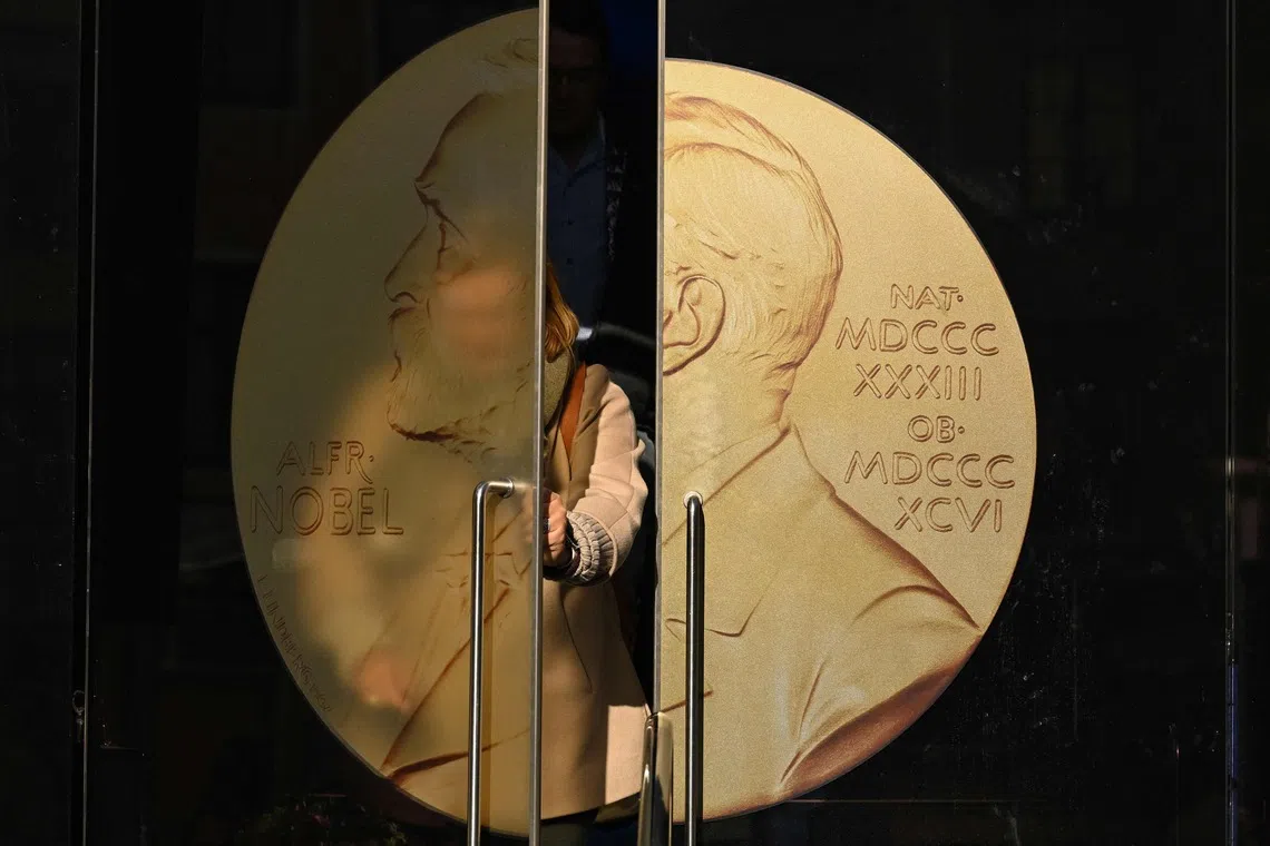 A person leaving the Swedish Academy ahead of the 2025 Nobel Prize in Literature, at the Swedish Academy in Stockholm, Sweden, on Oct 9, 2025.