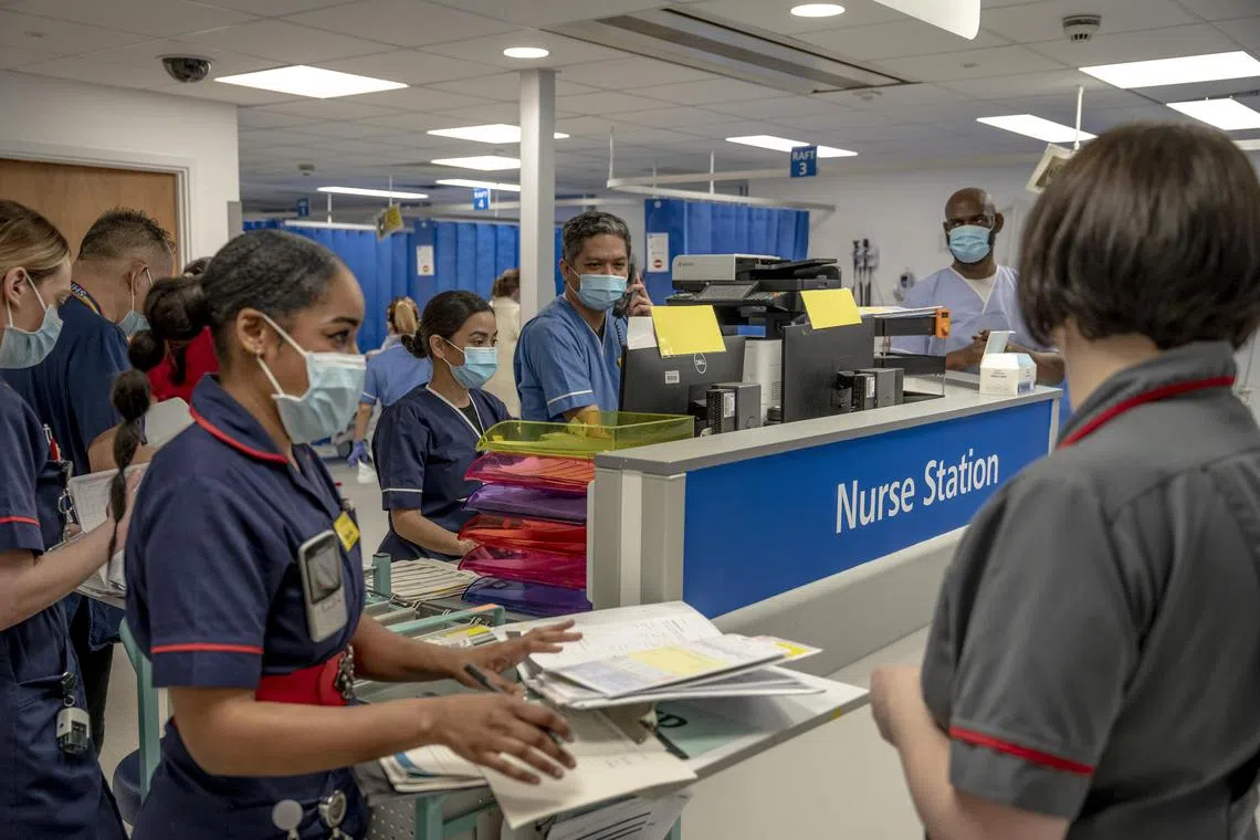 FILE — Staff work at the Queen’s Hospital emergency room, in Romford, England, on March 20, 2023. A government-commissioned review into the National Health Service laid bare the challenge Prime Minister Keir Starmer faces after years of underinvestment. (Andrew Testa/The New York Times)