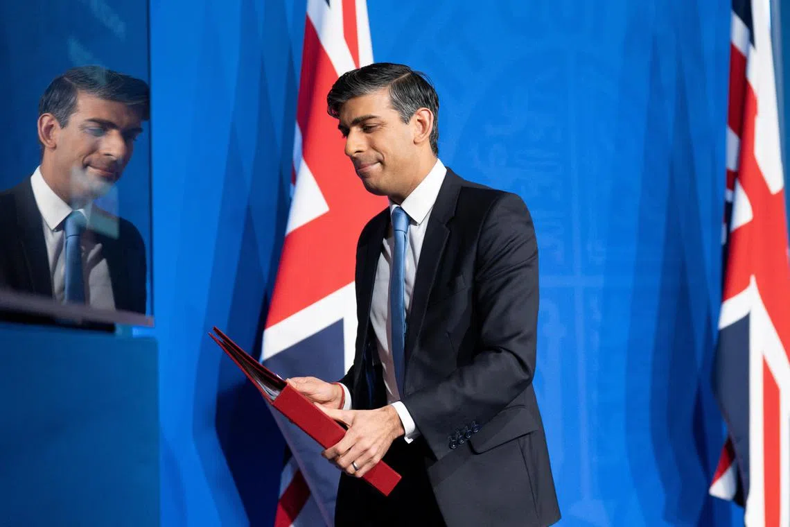 Prime minister, Rishi Sunak leaves a press conference in Downing Street in London, after he saw the Safety of Rwanda Bill pass its third reading in the House of Commons by a majority of 44 on Wednesday evening. Picture date: Thursday January 18, 2024. Stefan Rousseau/Pool via REUTERS