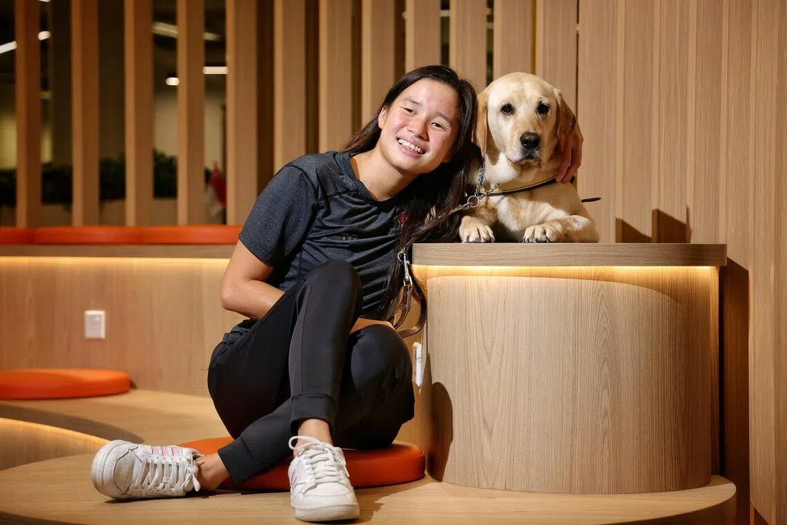 National para-swimmer Sophie Soon, seen here with her guide dog Orinda, will be taking part in the 2025 Toyota World Para Swimming Championships in Singapore.