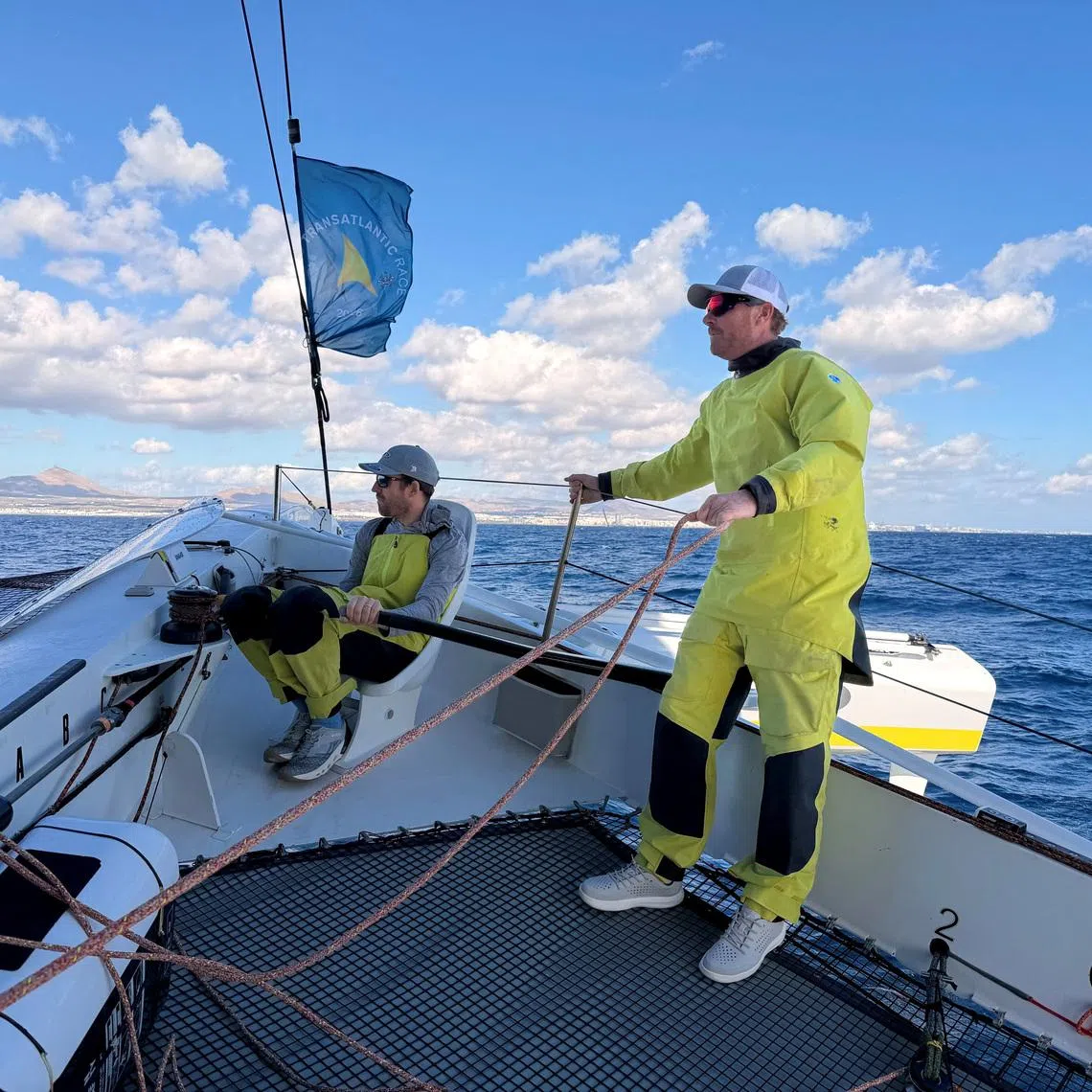 Sailing - 2026 RORC Transatlantic Race - Arrecife, Lanzarote, Spain - January 9, 2026 Britain's Sam Goodchild helms Argo during a practice sail of the MOD70 trimaran ahead of Sunday's start to the Lanzarote to Antigua ARORC Transatlantic Race. REUTERS/Ossian Shine