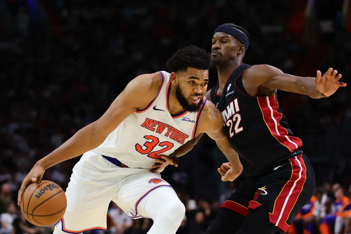 New York Knicks centre Karl-Anthony Towns (32) driving to the basket against Miami Heat forward Jimmy Butler (22) in their win on Oct 30.