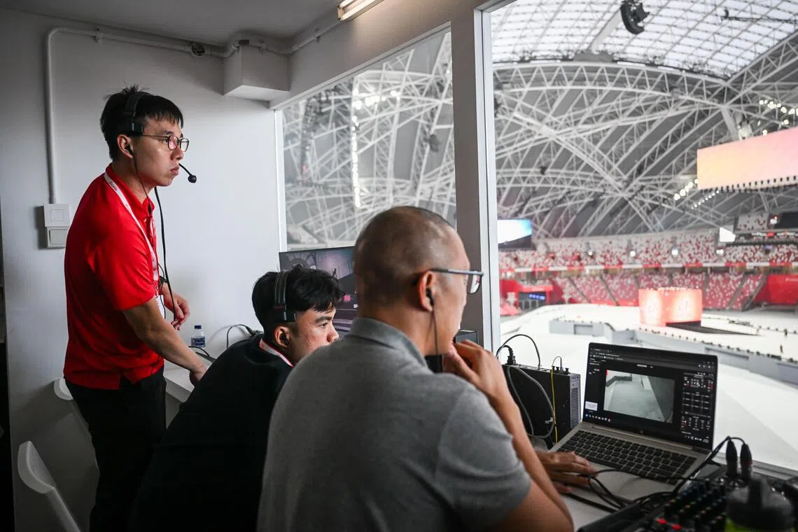 LTC Koh Jun Kiat, chairman of show management (in red), in action at the National Stadium on July 31.