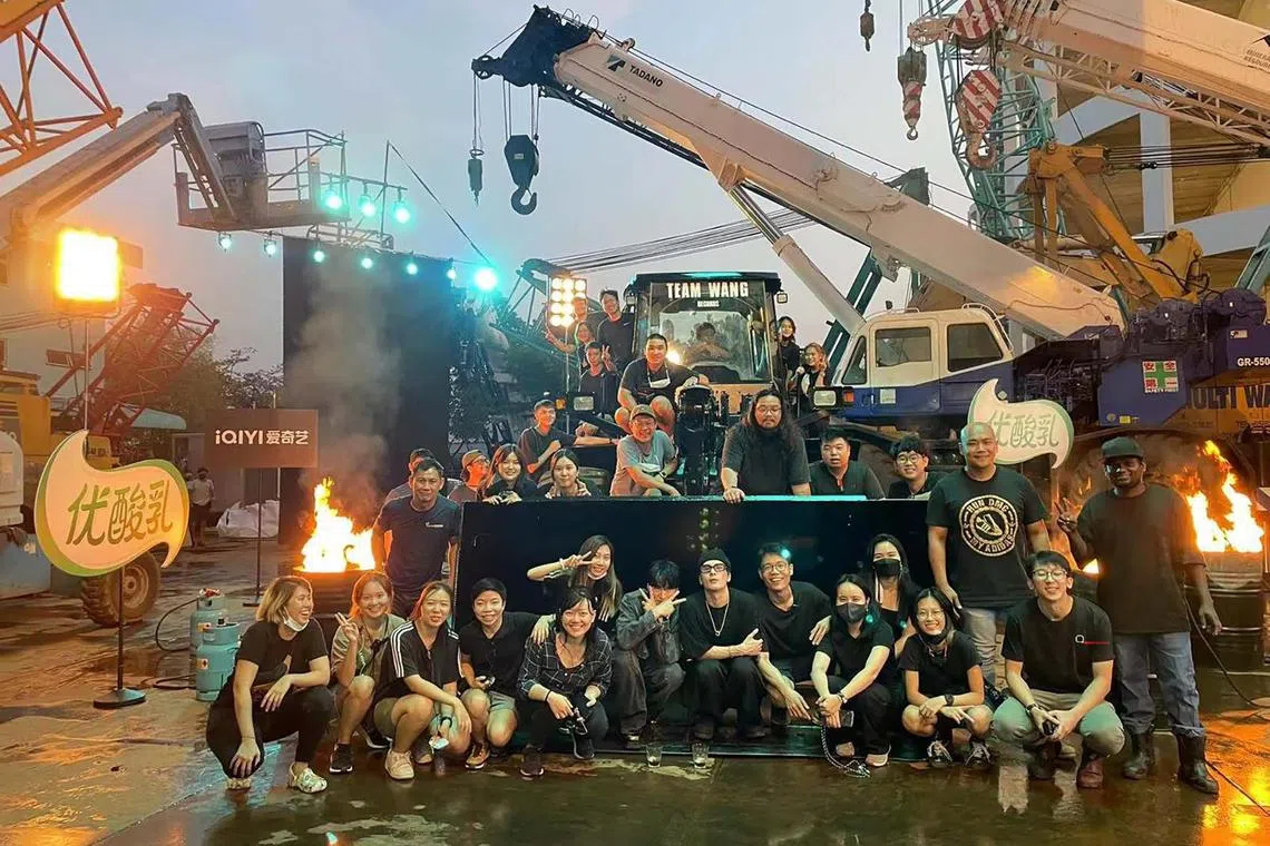 K-pop star and Hong Kong-born singer Jackson Wang and the local crew behind a music video filmed in Singapore. The video is for an episode of popular Chinese reality show The Rap Of China in 2022.