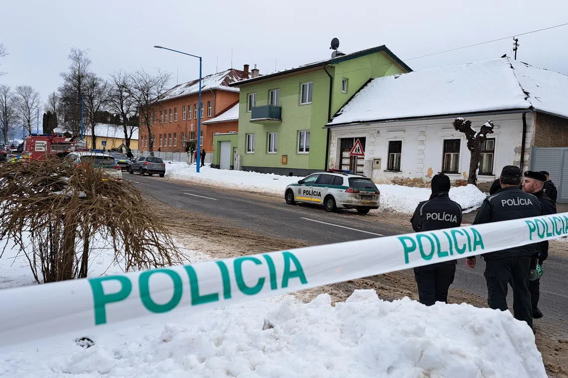 Police officers keep watch near a school following a knife attack in the town of Spisska Stara Ves, Slovakia, January 16, 2025. Adriana Hudecova/TASR/Handout via REUTERS