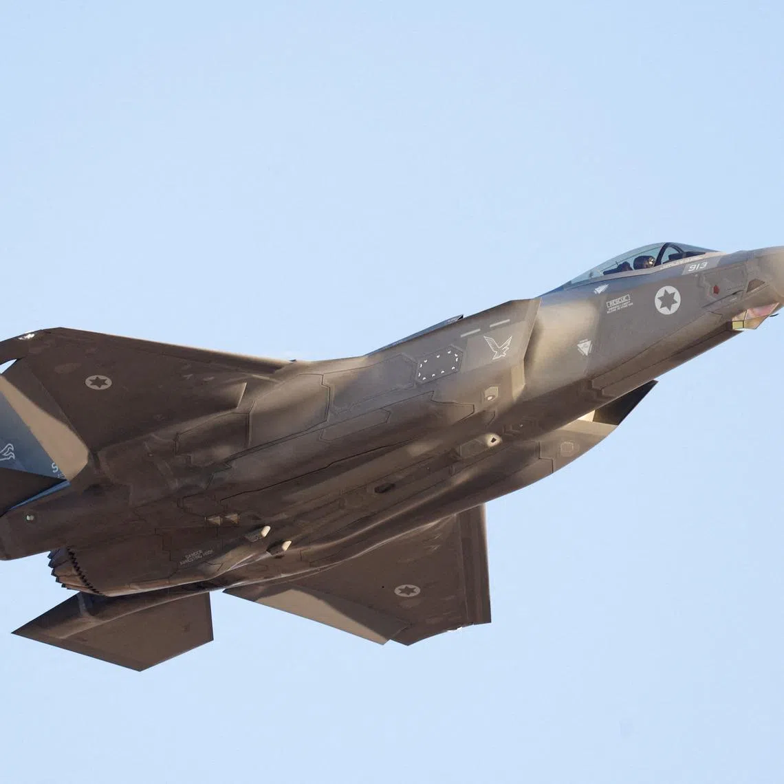 FILE PHOTO: A F-35 fighter jet flies during a graduation ceremony for Israeli Air Force pilots at Hatzerim Airbase, in southern Israel, June 29, 2023. REUTERS/Amir Cohen/File Photo