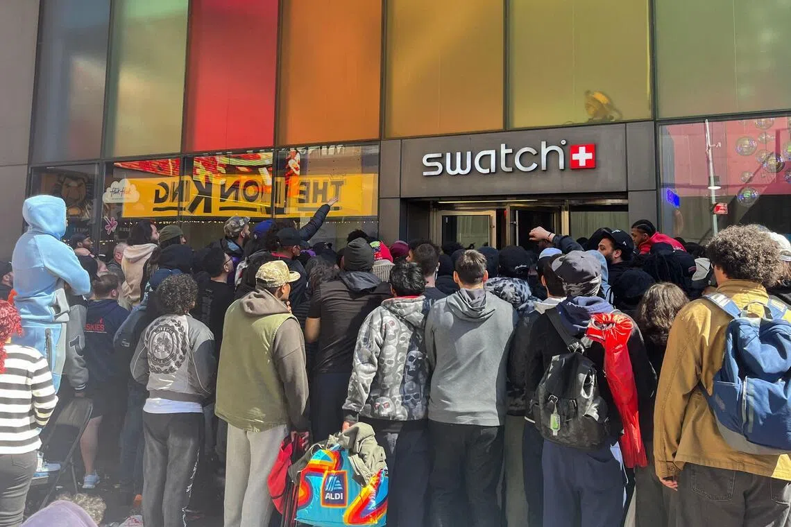 A queue at a Swatch store in New York on May 16, ahead of the Audemars Piguet x Swatch Royal Pop watch release.