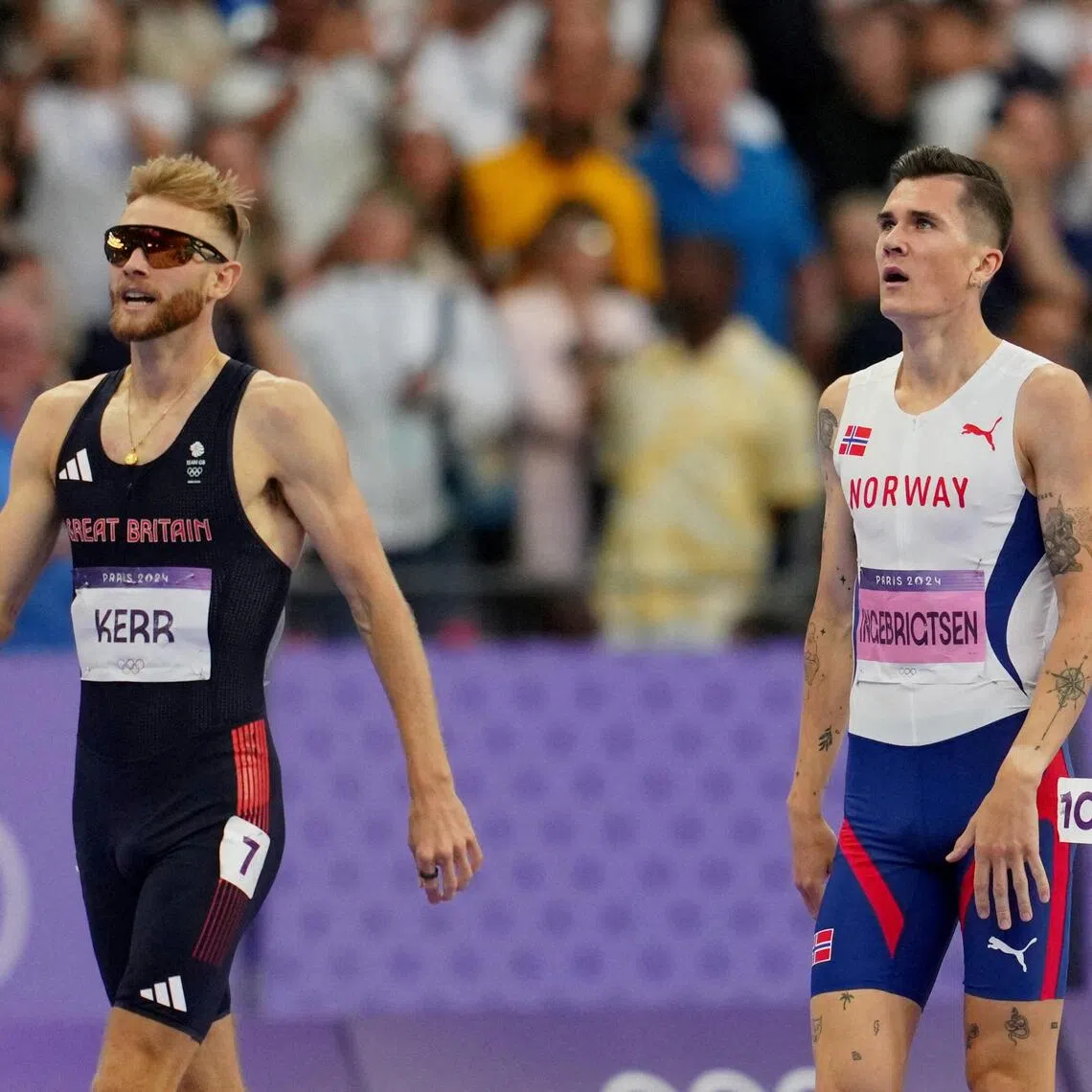 Josh Kerr of Britain (left) after winning silver at the 2024 Paris Olympics while Jakob Ingebrigtsen of Norway looks dejected.