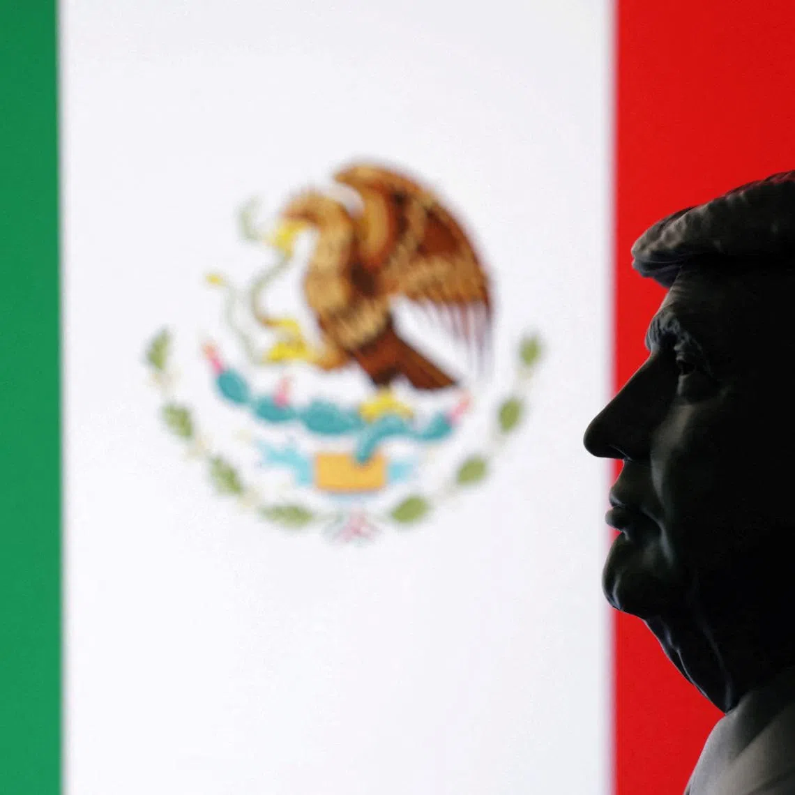 FILE PHOTO: A 3D-printed miniature model of U.S. President Donald Trump and the Mexico flag are seen in this illustration taken July 23, 2025. REUTERS/Dado Ruvic/Illustration/File Photo
