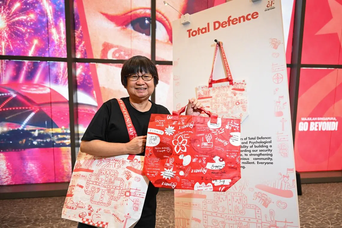 Mimi Ng said she included a children’s game in the design, as well as the sign language symbols for “SG 61” in the art work.