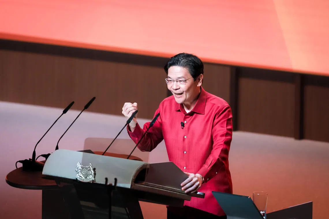 Prime Minister Lawrence Wong speaking at his maiden National Day Rally held at the Institute of Technical Education College Central on Aug 18, 2024.