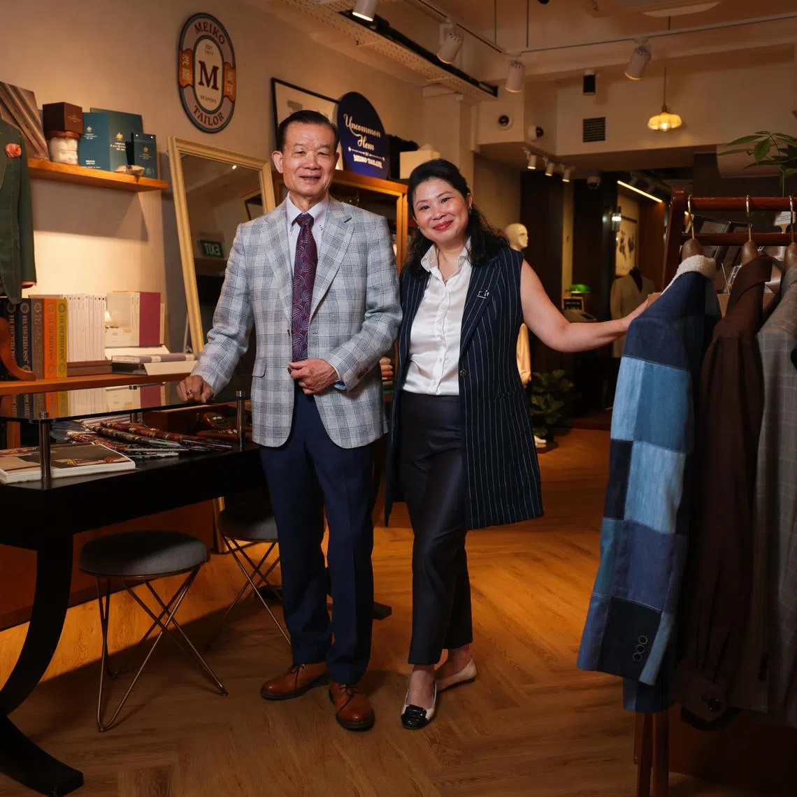 Master tailor Chung Chi Kwong, founder of Meiko Tailor, and his daughter Adele Chung, founder of Uncommon Hem by Meiko Tailor, at their new atelier in Boat Quay.