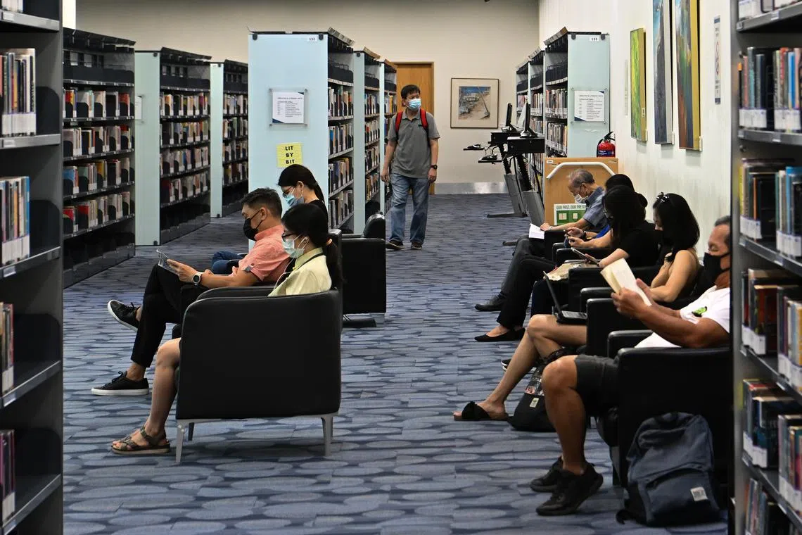 ST20220517-202263871122-Lim Yaohui-Fatimah Mujibah N Mohd-fmnlb17/ Central Public Library on May 17, 2022. It closes from 13 June 2022 for a revamp. The National Library Board (NLB) will launch its pilot “Grab-n-Go” service for book check-out at the Study Lounge on Level 5 of the National Library Building on 18 May 2022. This new system will augment other services, including NLB’s eResources, that will enable NLB patrons to continue reading and learning, even as the Central Public Library closes from 13 June 2022 for a revamp. The new “Grab-n-Go” service will offer patrons about 5,000 English, Chinese, Malay, and Tamil adult titles to choose from. With the use of Ultra-High Frequency Radio Frequency Identification, patrons can simply walk through the gantry to check out all the books (up to eight titles) at once. (ST PHOTO: LIM YAOHUI)