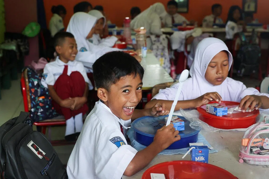 Initially, meals will be given to around 20 million students from January at a cost of 71 trillion rupiah (S$5.9 billion).