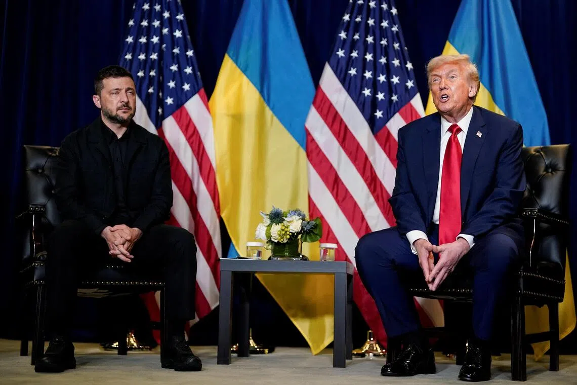 US President Donald Trump (right) and Ukrainian President Volodymyr Zelensky meeting at the UN General Assembly gathering in New York City on Sept 23.