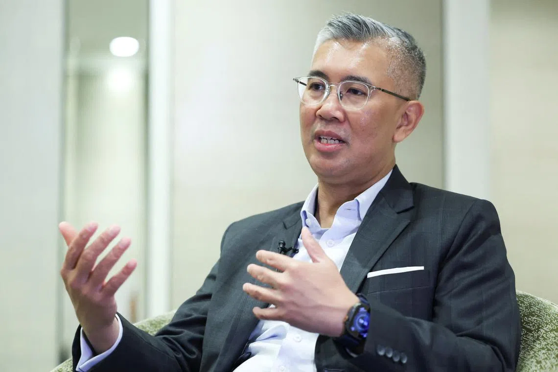 FILE PHOTO: Malaysia's Trade Minister Tengku Zafrul Aziz speaks during an interview with Reuters at Kuala Lumpur, Malaysia March 5, 2025. REUTERS/Hasnoor Hussain