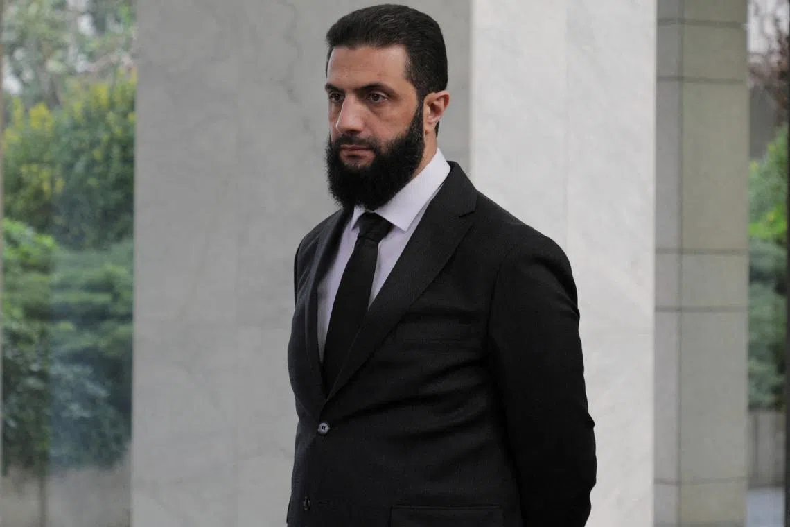 FILE PHOTO: Syria's de facto leader Ahmed al-Sharaa, also known as Abu Mohammed al-Golani in Damascus, Syria, December 30, 2024. REUTERS/Khalil Ashawi/File Photo