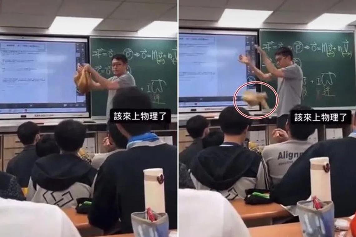 Mr Lee Feng can be seen in this screenshot of a Facebook video dropping his cat, named Laifu, in front of his students.