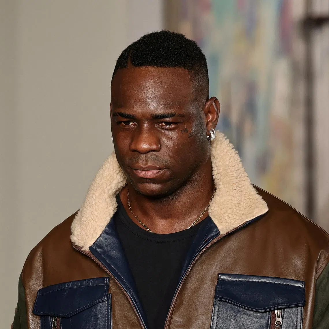 Soccer player Mario Balotelli during  Men's Fashion Week in Paris, France, June 28, 2025. REUTERS/Gonzalo Fuentes/File Photo