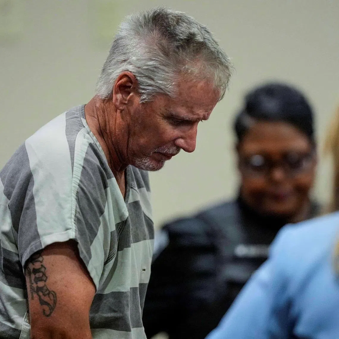Colin Gray, 54, the father of Apalachee High School shooter Colt Gray, 14, who is charged as an adult with four counts of murder in the deaths of Mason Schermerhorn and Christian Angulo, both 14, Richard Aspinwall, 39, and Cristina Irimie, 53, enters the Barrow County courthouse for his first appearance, in Winder, U.S., September 6, 2024.  Brynn Anderson/Pool via REUTERS