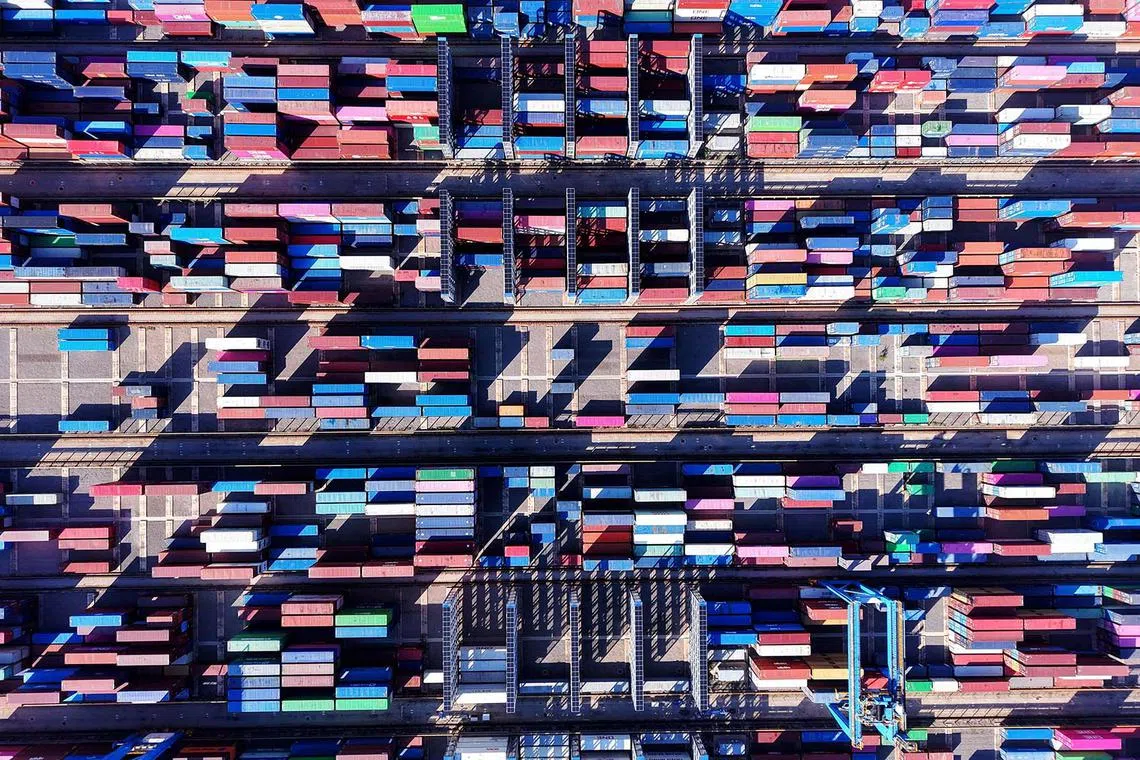 Containers are seen at the port in Qingdao, China, on July 28, 2025. 