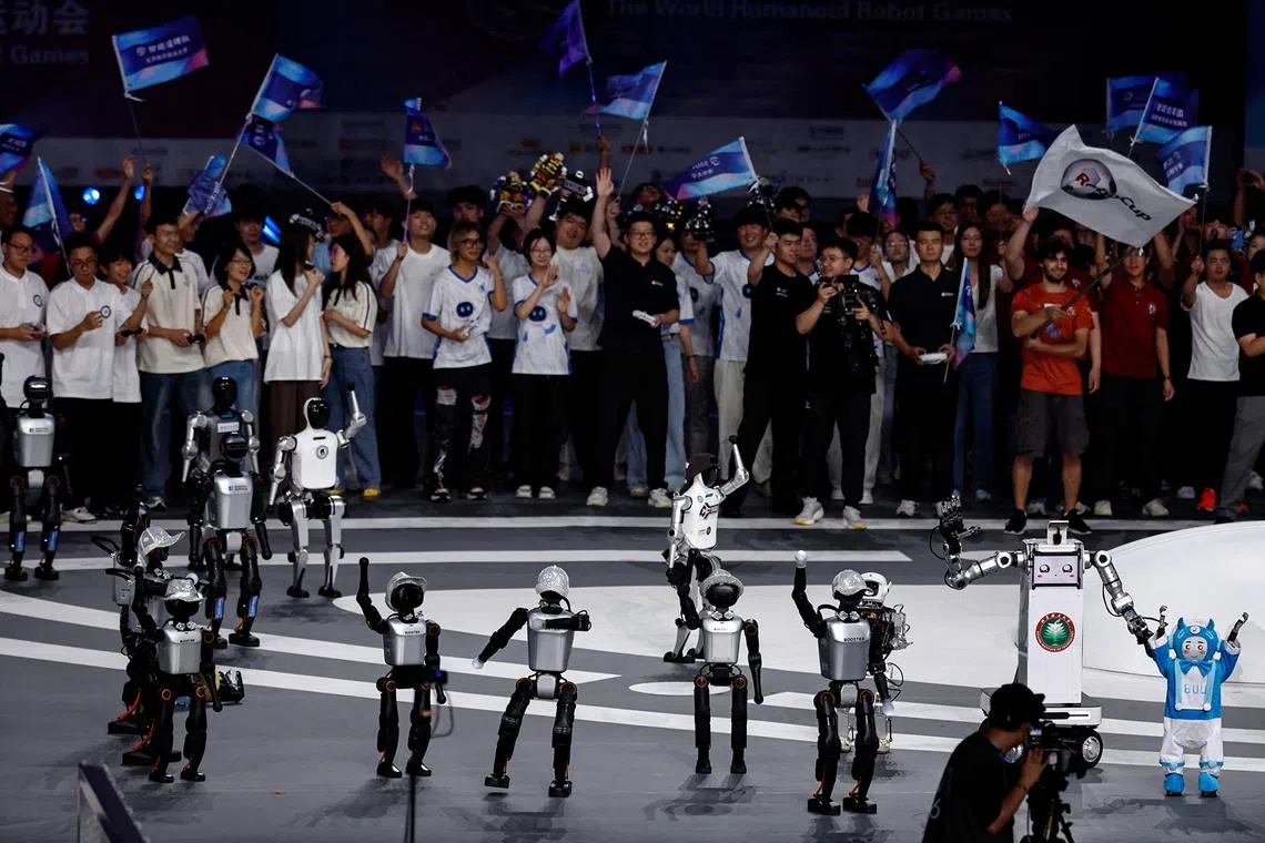 Humanoid robots and teams at the opening ceremony of the inaugural World Humanoid Robot Games at the National Speed Skating Oval in Beijing, China, on Aug 14, 2025. 