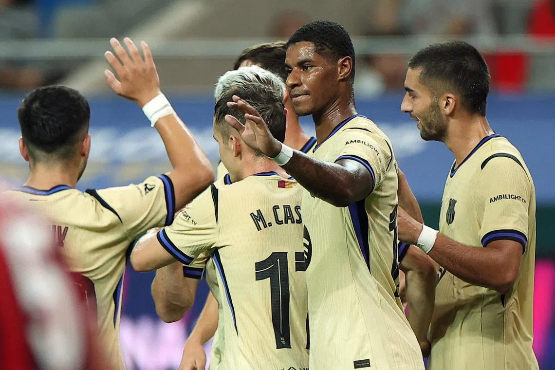 FILE PHOTO: Soccer Football - Pre-Season Friendly - FC Seoul v FC Barcelona - Seoul World Cup Stadium, Seoul, South Korea - July 31, 2025 FC Barcelona's Ferran Torres celebrates scoring their fifth goal with Marcus Rashford REUTERS/Kim Hong-Ji/File Photo