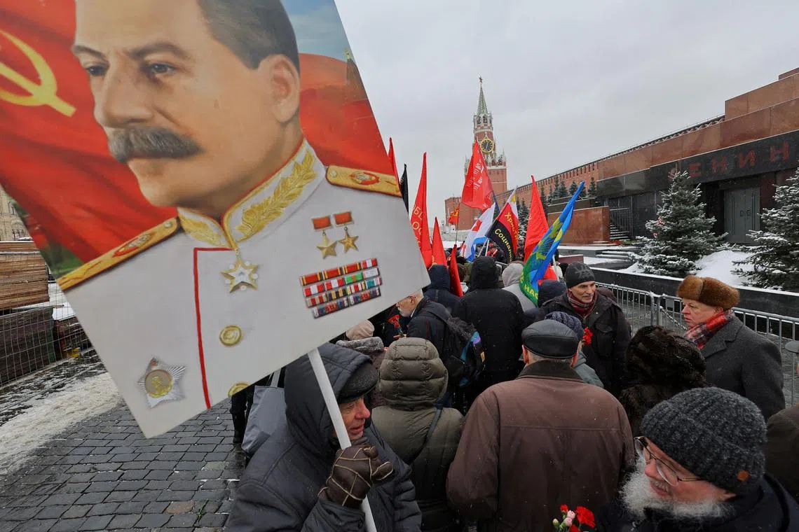 FILE PHOTO: Supporters of the Russian Communist Party attend a ceremony marking the 70th anniversary of Soviet leader Josef Stalin's death in Red Square in Moscow, Russia March 5, 2023. REUTERS/Evgenia Novozhenina/File Photo