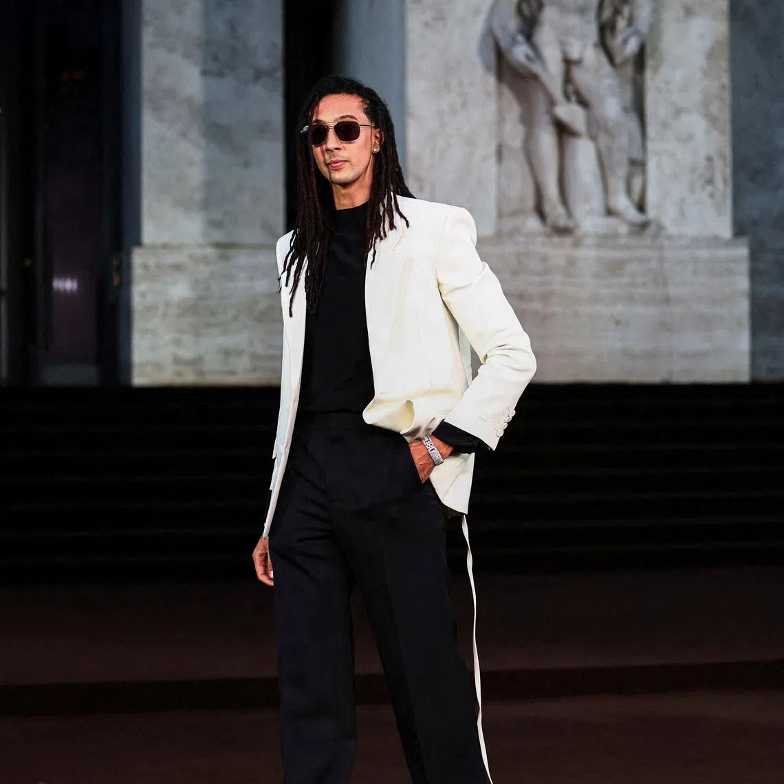 FILE PHOTO: Ghali arrives for Gucci's exclusive screening of 'The Tiger', a short film directed by Spike Jonze and Halina Reijn during Milan Fashion Week, in Milan, Italy, September 23, 2025. REUTERS/Yara Nardi/File Photo