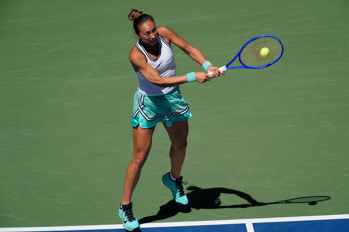 China’s Zheng Qinwen Zheng hitting the ball in her US Open round-of-16 match against Polish star Iga Swiatek (not pictured).