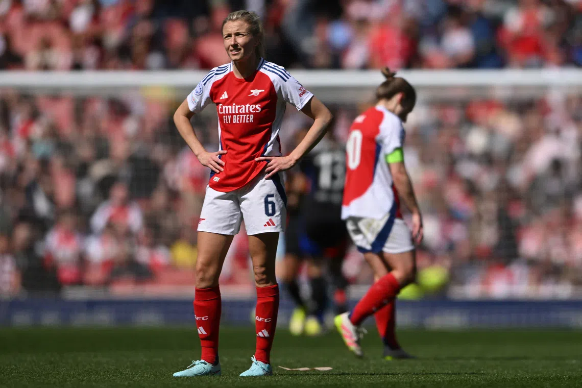 Soccer Football - Women's Champions League - Semi Final - First Leg - Arsenal v Olympique Lyonnais - Emirates Stadium, London, Britain - April 19, 2025 Arsenal's Leah Williamson looks dejected after the match REUTERS/Jaimi Joy