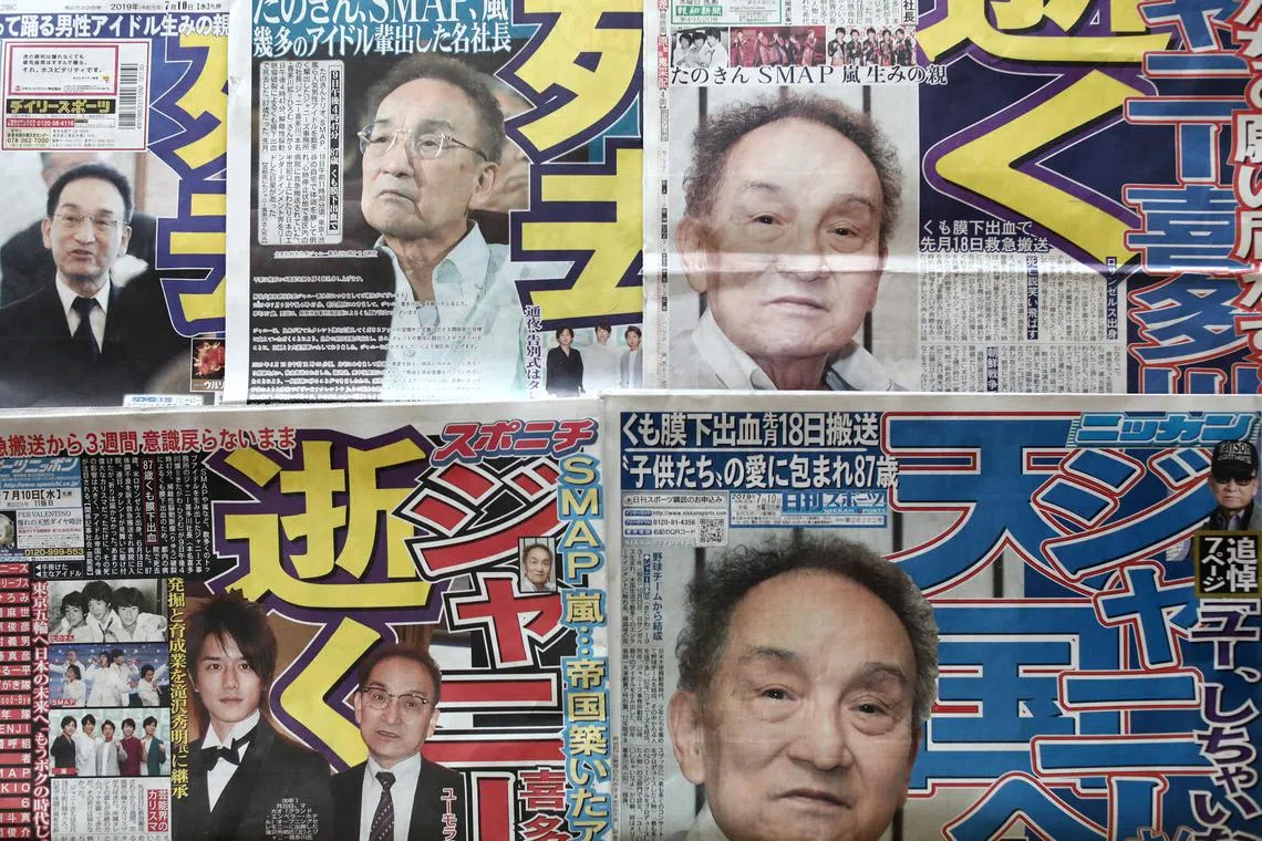 This photo illustration taken in Tokyo on July 10, 2019 shows front pages of Japanese daily newspapers publishing pictures of Japan's leading boyband star-maker Johnny Kitagawa, who died on July 9, 2019. He was accused of sexually assaulting his young recruits for decades.