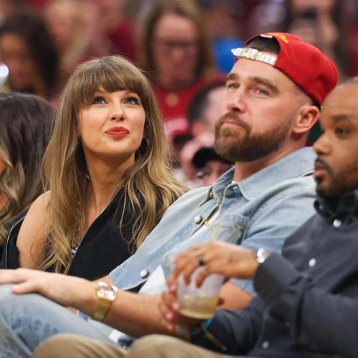 Singer Taylor Swift and fiance Travis Kelce watching a basketball match between the New York Knicks and the Cleveland Cavaliers in Cleveland, Ohio, on May 23.