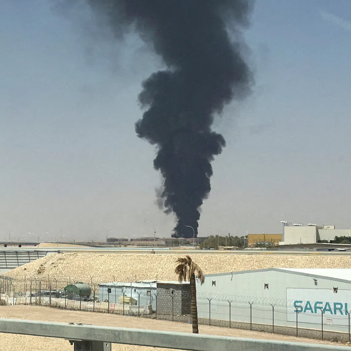 FILE PHOTO: Large plume of black smoke rises from the fuel storage area at King Khalid International Airport, in Riyadh, Saudi Arabia, September 19, 2026. Picture taken with a mobile phone. REUTERS/Stringer/File Photo