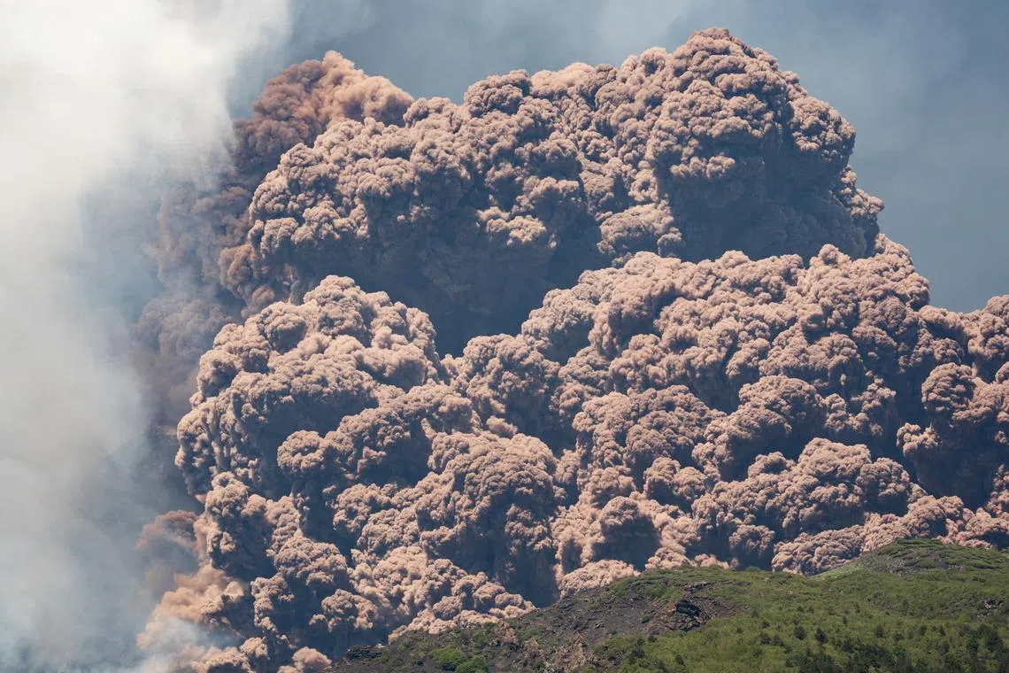 Plumes of ash and volcanic steam rise from Mount Etna, as seen from Milo, Italy, June 2, 2025. REUTERS/Marco Restivo