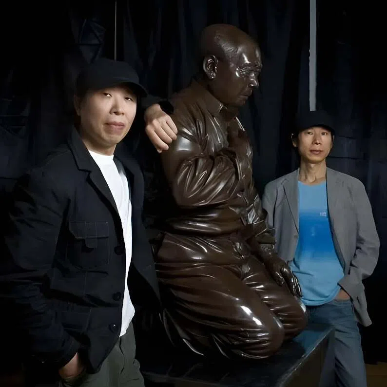 Gao Zhen (left) and his brother Gao Qiang with their artwork, titled Mao’s Guilt, in Beijing in 2009.