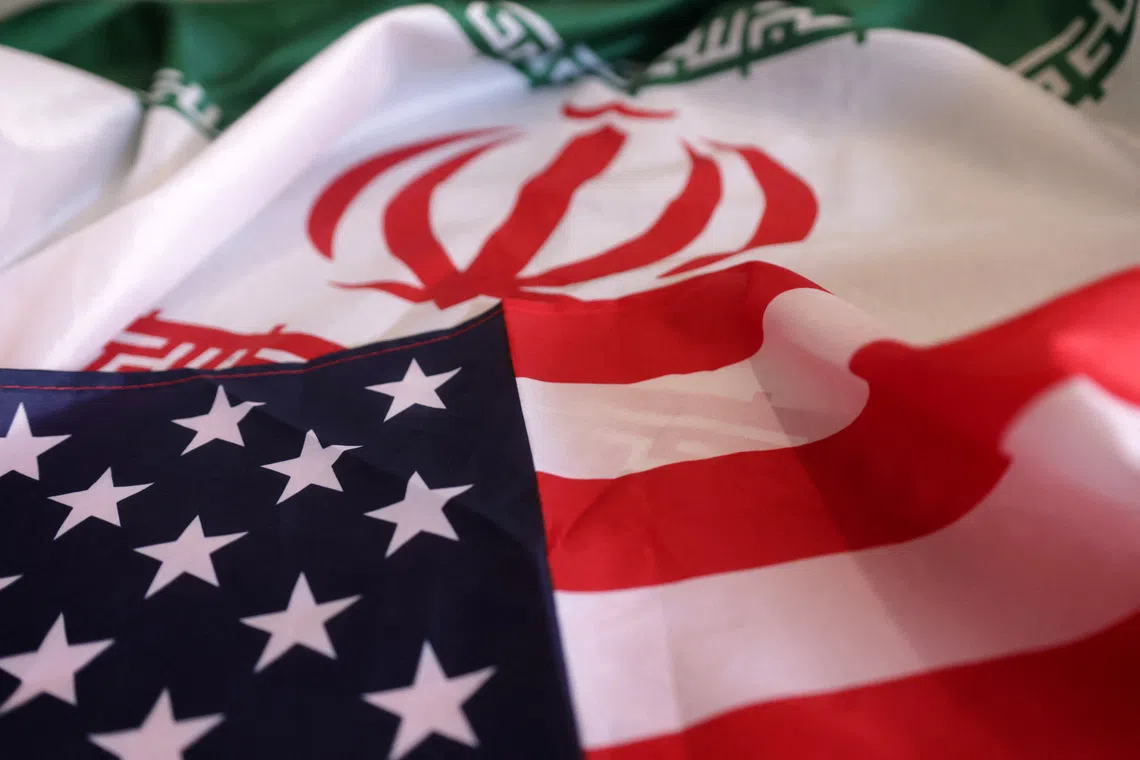 USA and Iranian flags are seen in this illustration taken, September 8, 2022. REUTERS/Dado Ruvic/Illustration