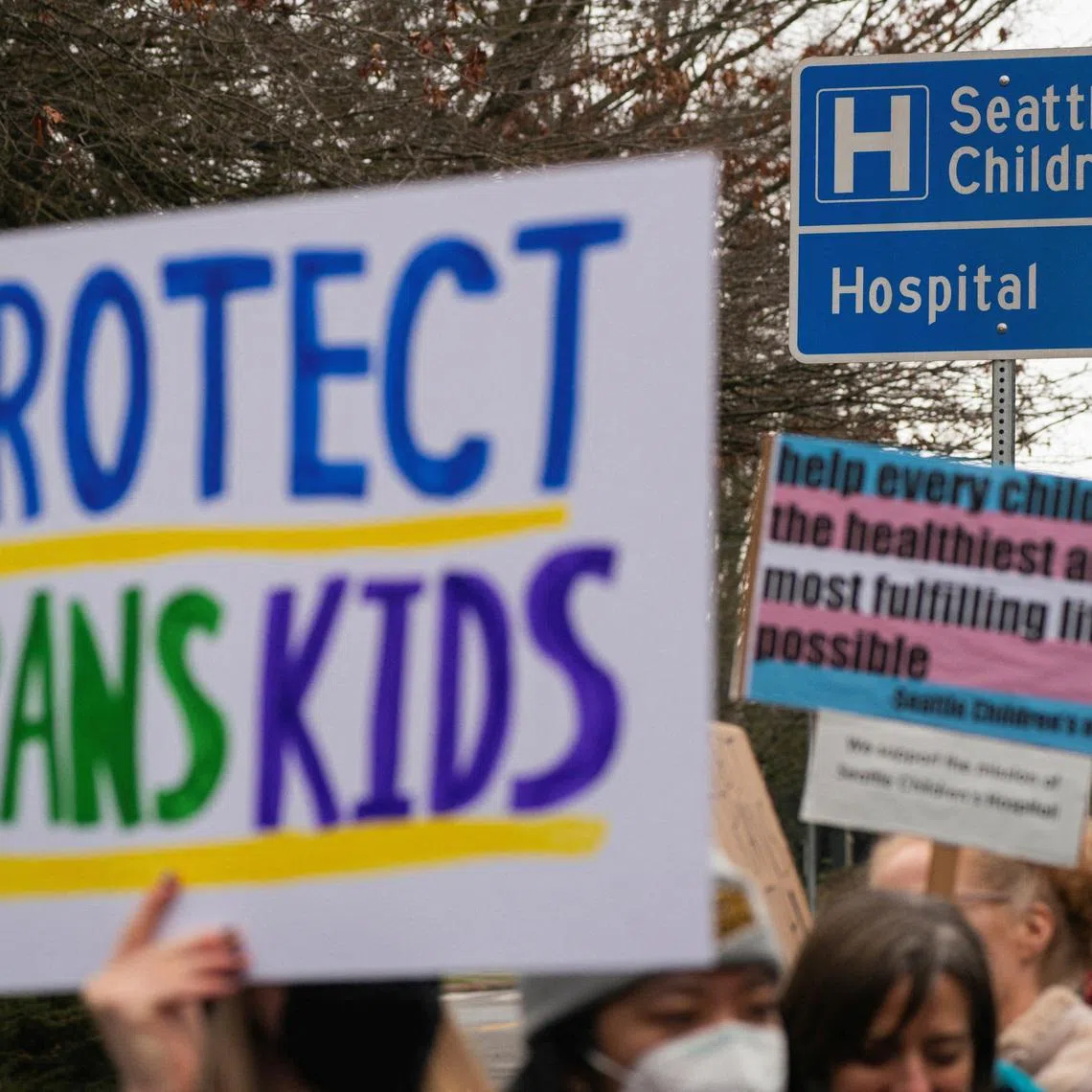 FILE PHOTO: Demonstrators gather for a rally in support of trans youth at Seattle Children's hospital, following U.S. President Donald Trump's executive order that denies federal funding for pediatric gender-affirming care, in Seattle, Washington, U.S. February 8, 2025. REUTERS/David Ryder/File Photo
