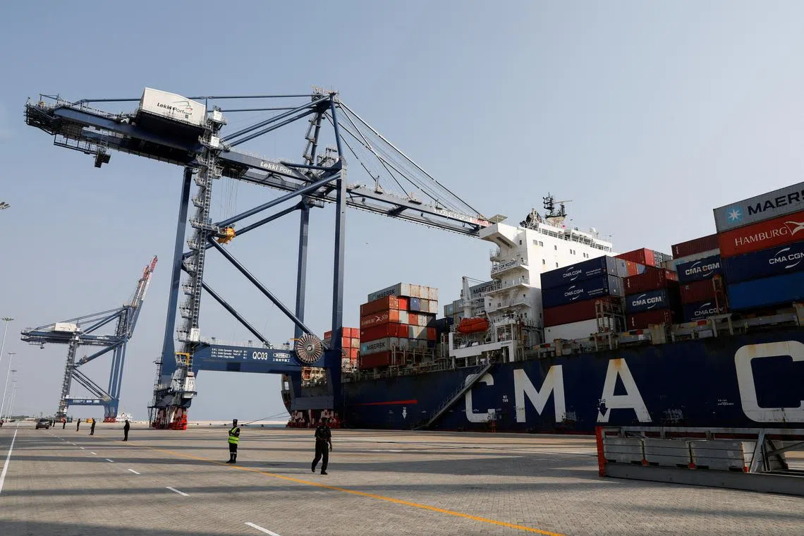 FILE PHOTO: A view shows cranes and a container ship at the newly-commissioned Lekki Deep Sea Port in Lagos, Nigeria, January 23, 2023. REUTERS/Temilade Adelaja/File Photo