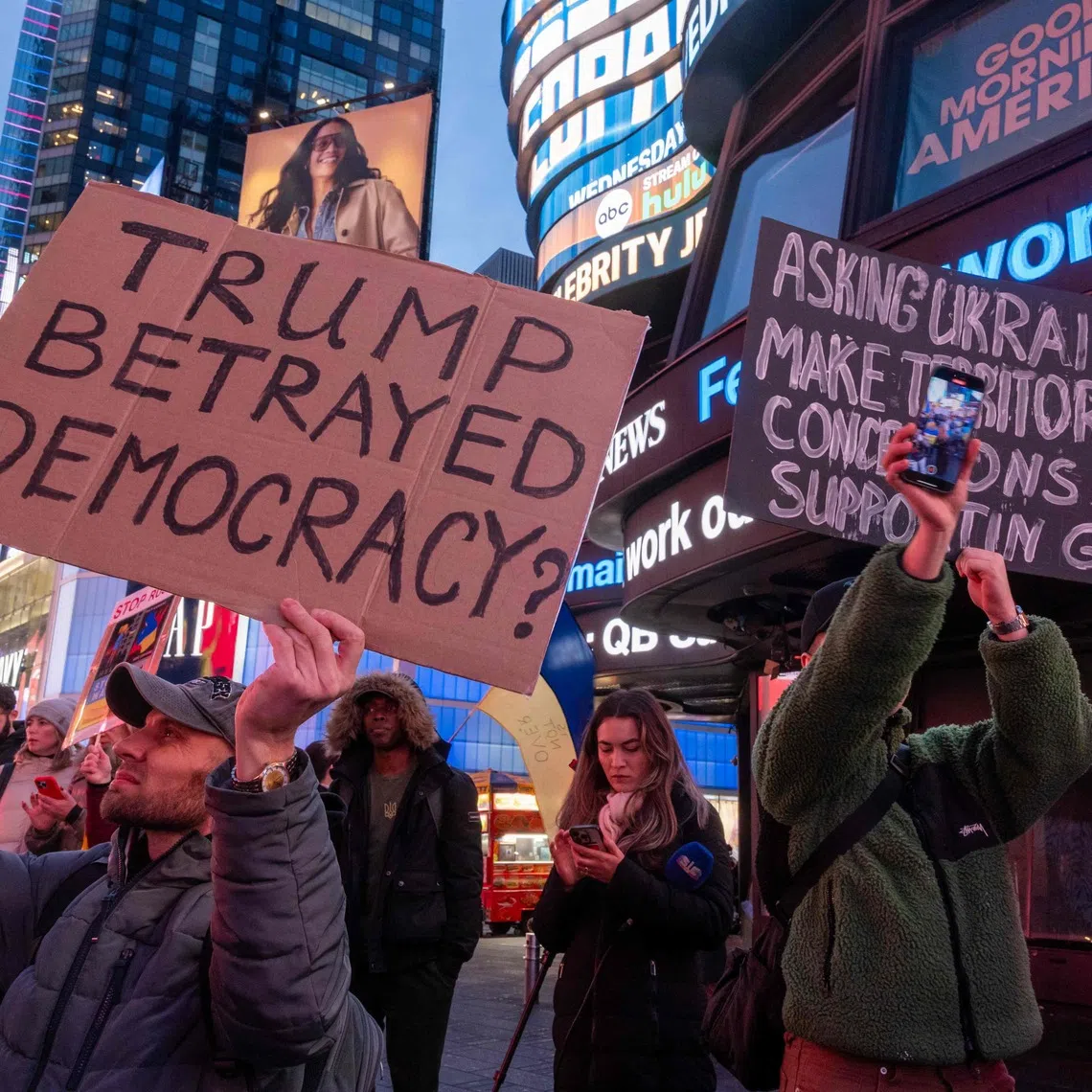 Supporters of Ukraine rally in Times Square to mark the three-year anniversary of the invasion by Russia, in New York City, on Feb 24. 