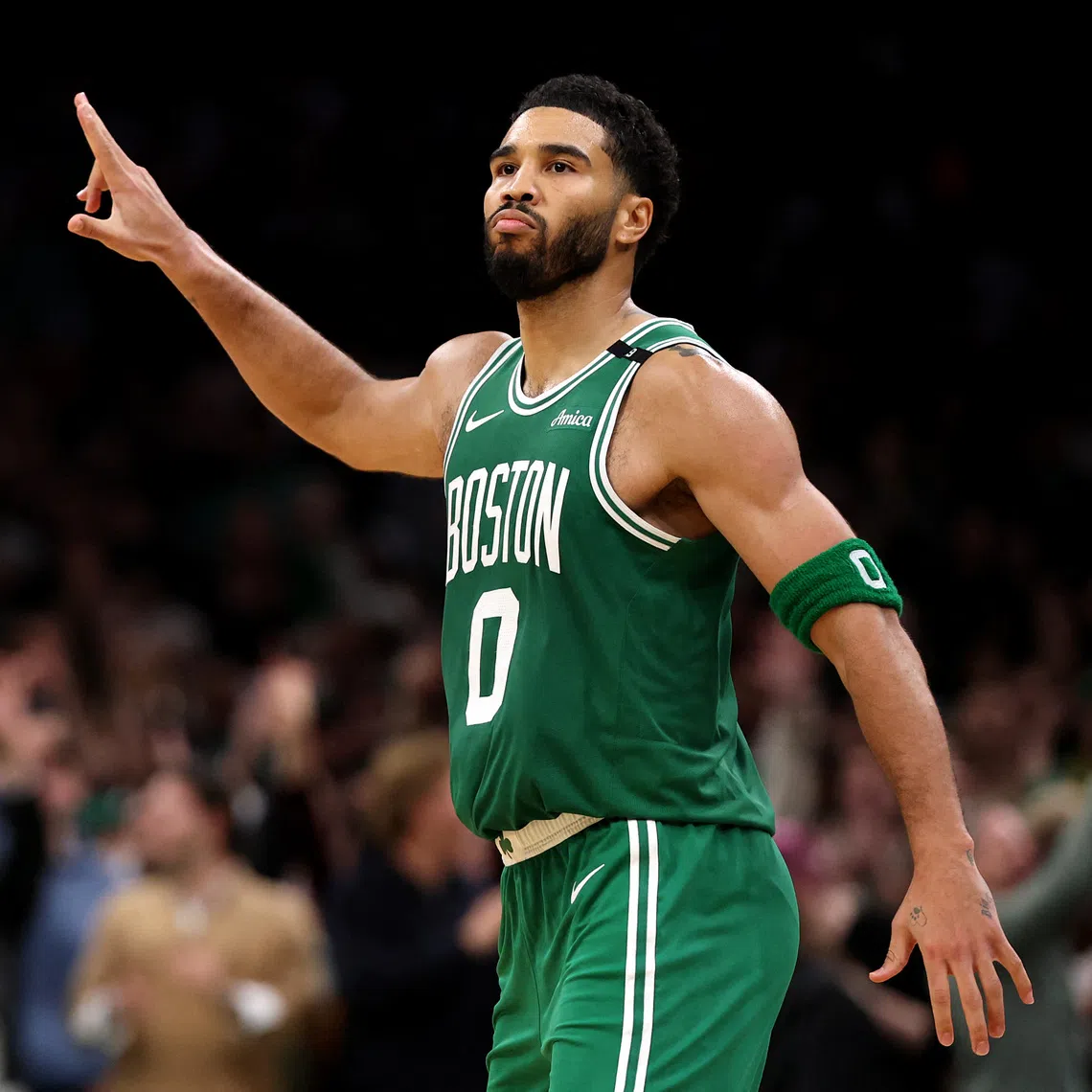 Jayson Tatum of the Boston Celtics celebrates against the New York Knicks.