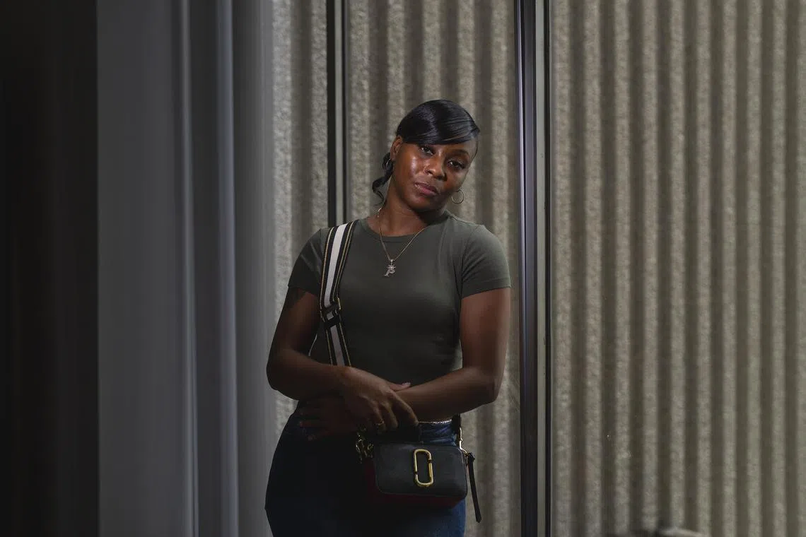 Porcha Woodruff, 32, the first woman known to be wrongfully accused as a result of facial recognition technology, in Oak Park, Mich., Aug. 5, 2023. Woodruff thought the police who showed up at her door to arrest her for carjacking were joking. (Nic Antaya/The New York Times)