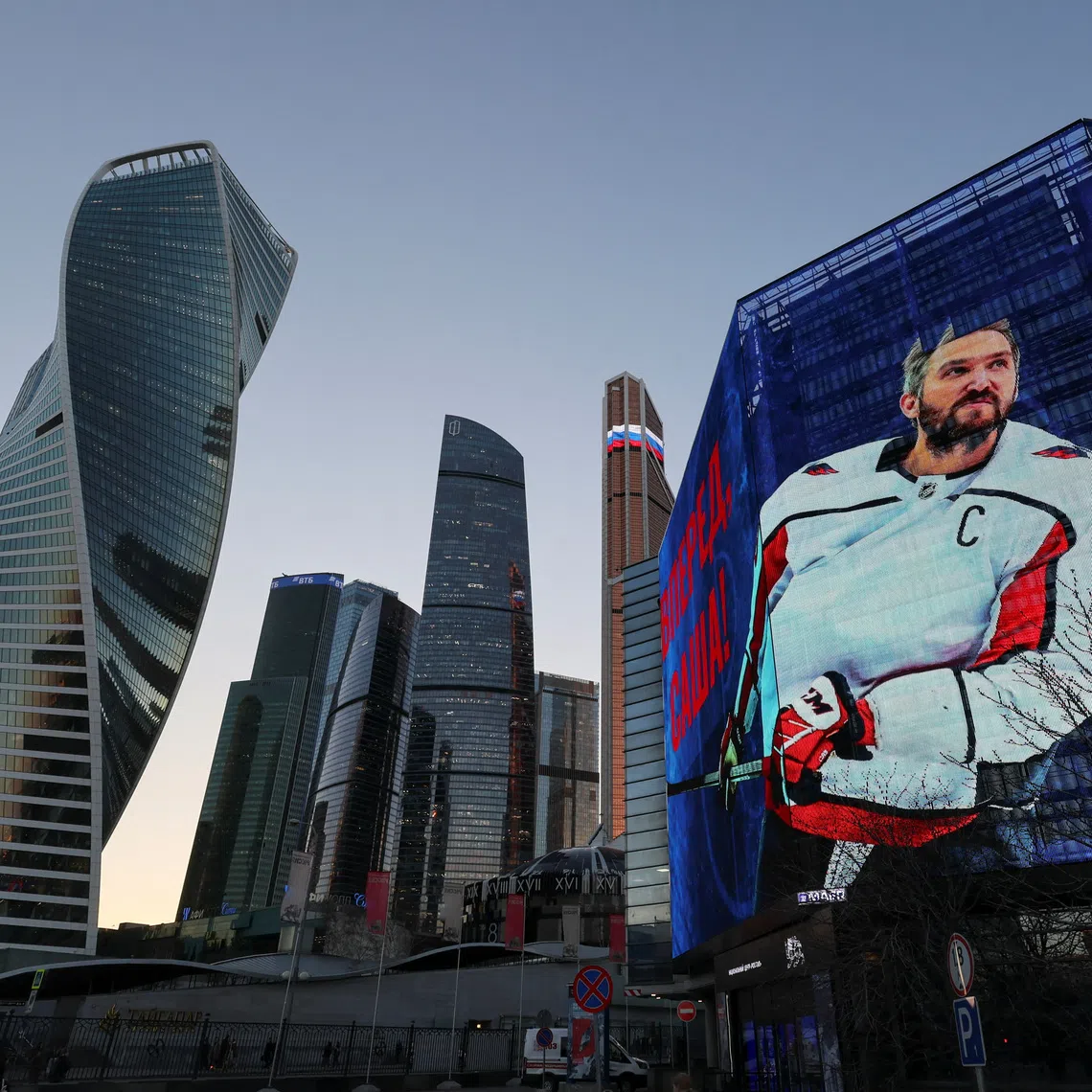 Alexander Ovechkin, the captain of the National Hockey League's Washington Capitals, is seen on a screen in support of his anticipated goals record, with backdrops of Moscow International Business District, also known as Moskva City, in Moscow, Russia April 3, 2025.  REUTERS/Shamil Zhumatov