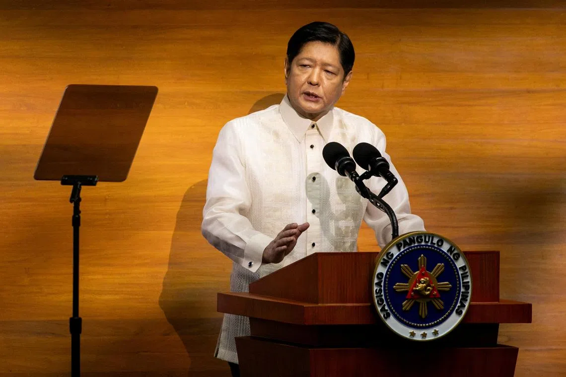 FILE PHOTO: Philippine President Ferdinand Marcos Jr. gestures as he delivers his second State of the Nation Address (SONA), at the House of Representative in Quezon City, Metro Manila, Philippines, July 24, 2023. REUTERS/Lisa Marie David/File photo