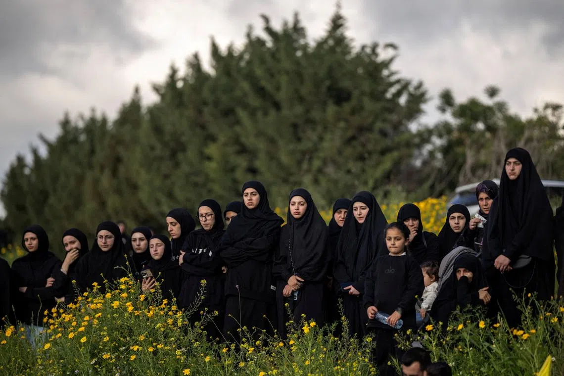 Mourners attending the funeral of those who were killed during the conflict with Israel before a 10-day ceasefire between Lebanon and Israel went into effect, in Kfar Sir, Lebanon, April 21.