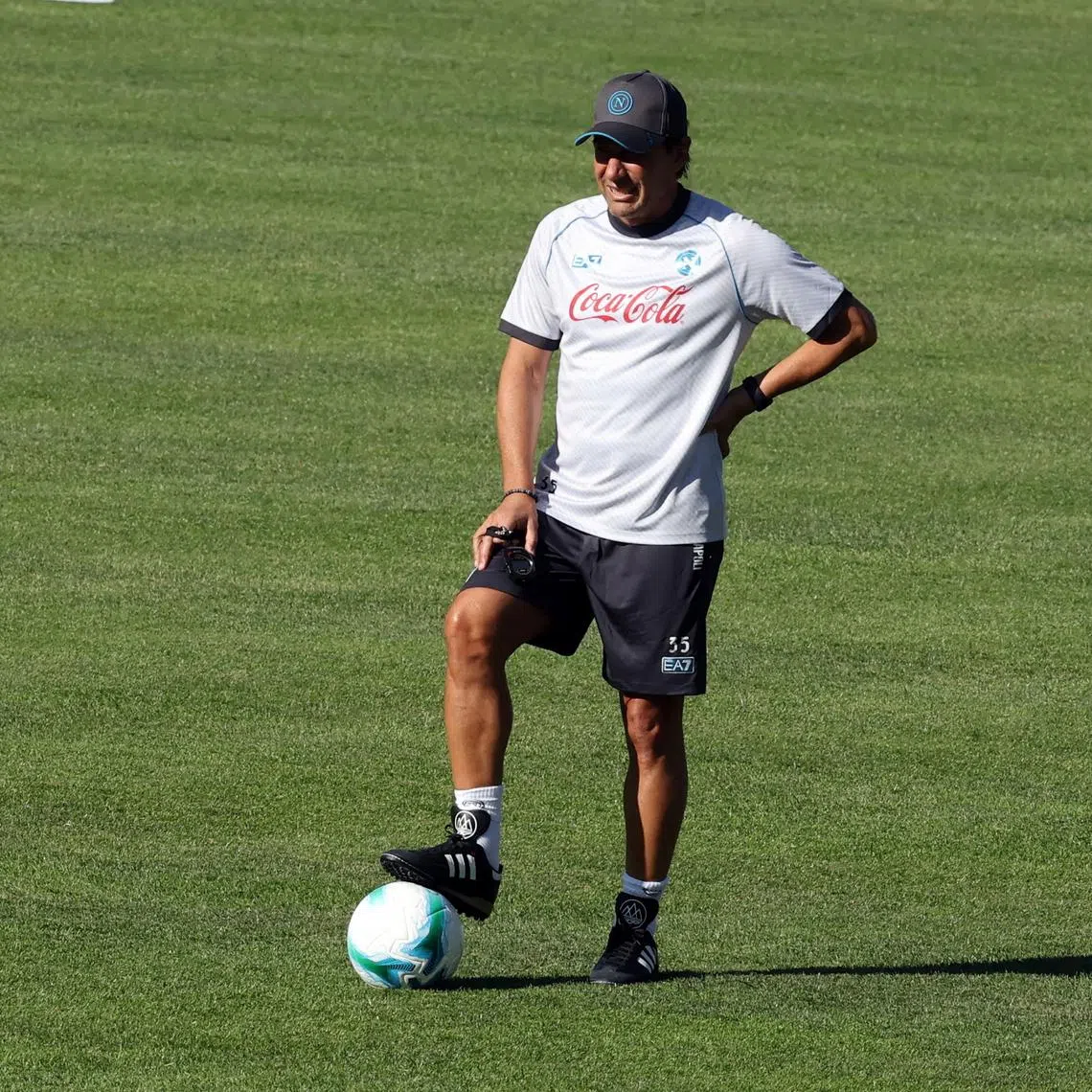 FILE PHOTO: Soccer Football - Napoli Training - Stadio di Carciato, Dimaro, Italy - July 17, 2025 Napoli coach Antonio Conte during training REUTERS/Ciro De Luca/File Photo