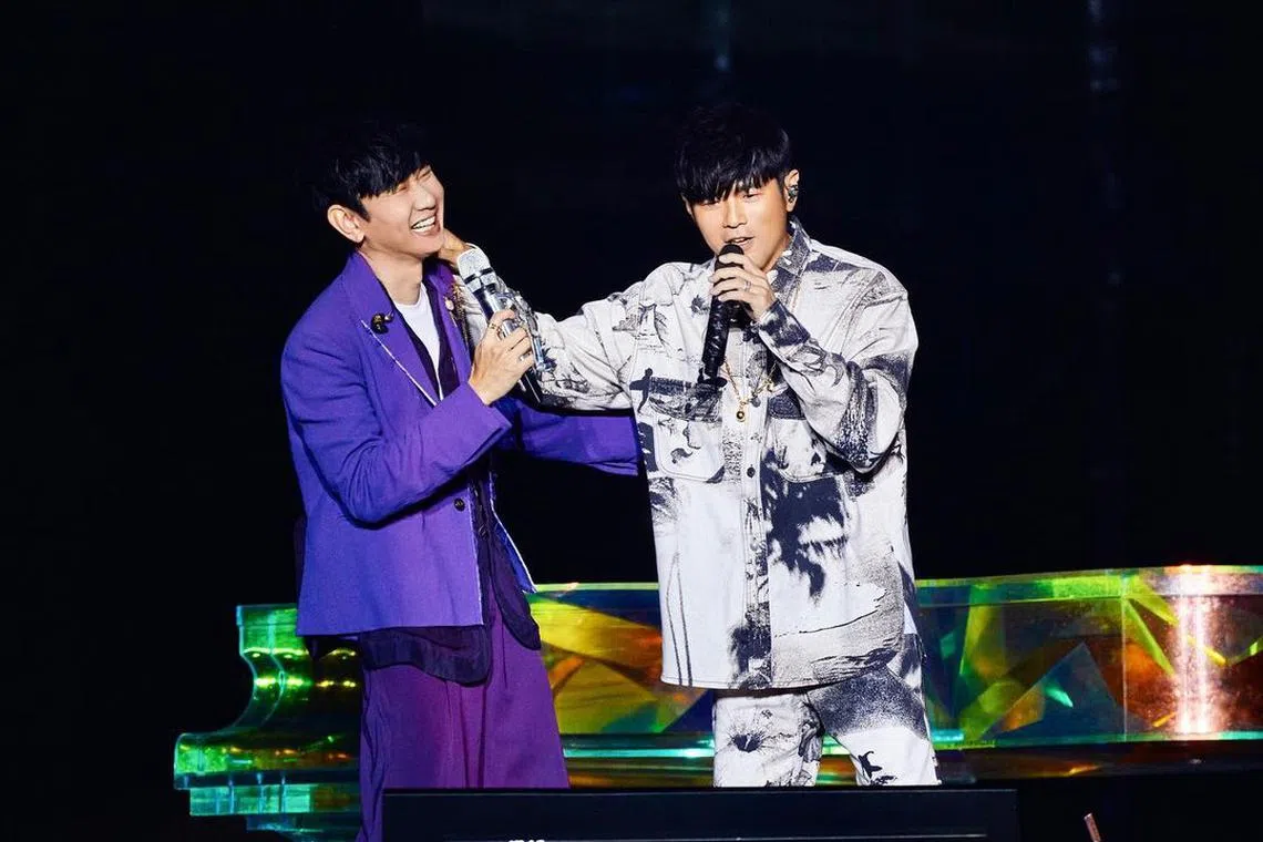 Singaporean singer JJ Lin (left) and Taiwanese Mandopop king Jay Chou at Lin's Taipei concert on Dec 4, 2022.