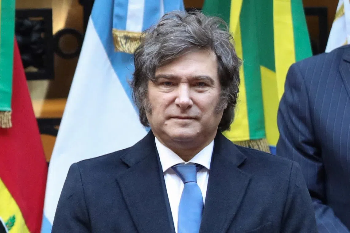 FILE PHOTO: Argentine President Javier Milei poses for a family photo at the Summit of Presidents of MERCOSUR, in Buenos Aires, Argentina, July 3, 2025. REUTERS/Alessia Maccioni/File Photo